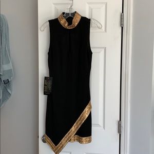 Sleeveless black Bebe dress with gold beading